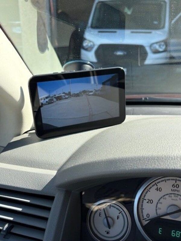 Red Chrysler Town and Country with BraunAbility Side Entry Automatic Fold Out conversion